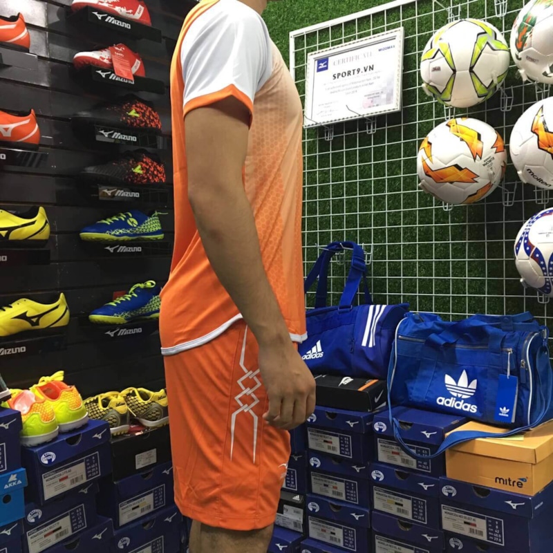 Hình ảnh của Áo bóng đá keep & fly màu cam trắng